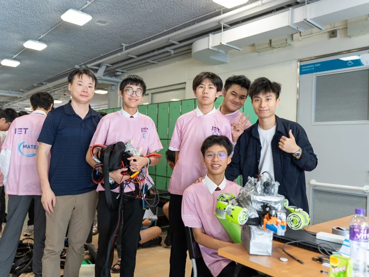 The team presenting its underwater robot