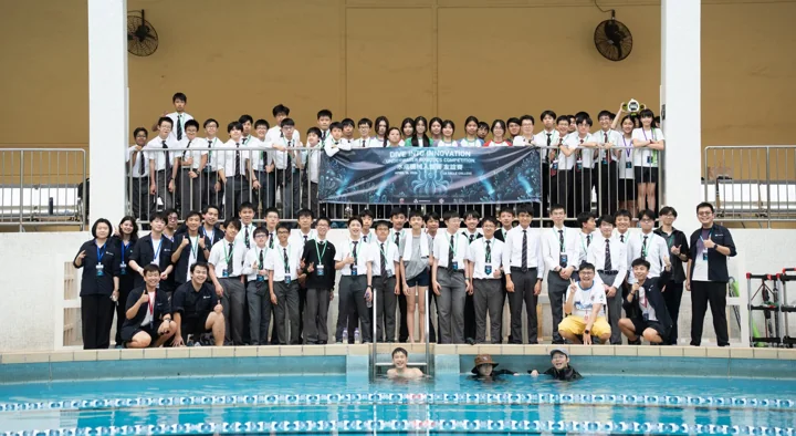 The participating school teams gathered beside the competition pool